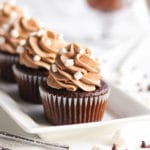 Moist hot chocolate cupcakes stuffed with marshmallow fluff and frosted with silky smooth whipped hot chocolate buttercream!