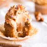 Deliciously moist and fluffy pear cupcakes filled with rich dulce de leche and topped with a silky crown of dulce de leche swiss meringue buttercream!