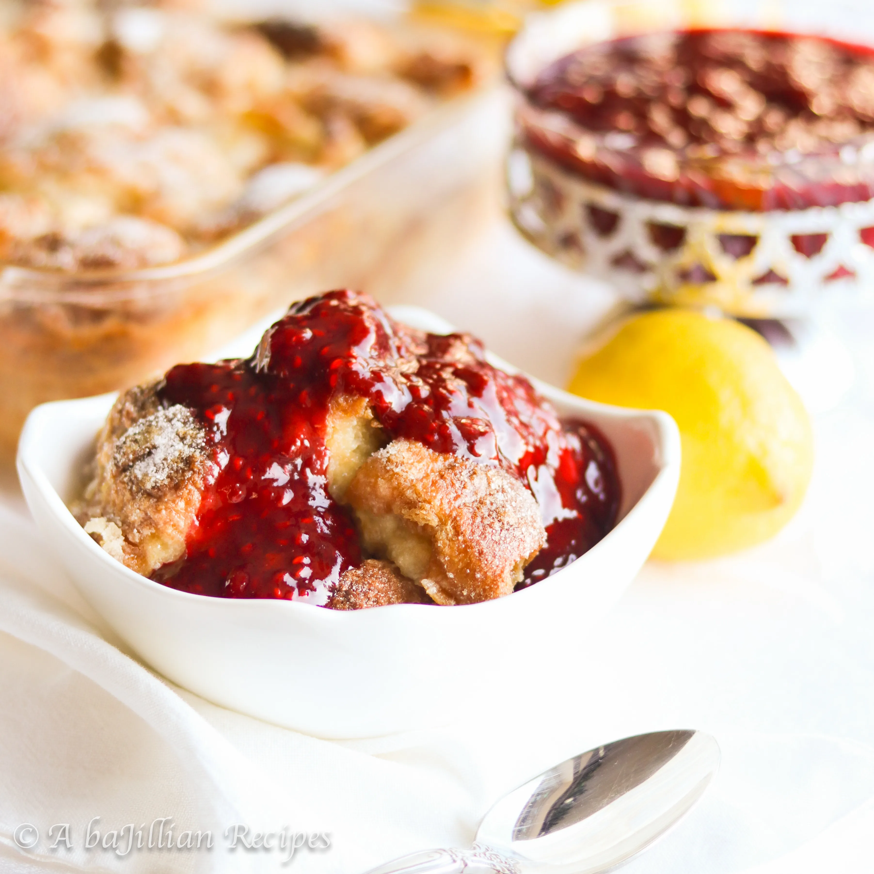 Buttery, flakey croissants baked in a lusciously tart and lemony custard and topped with the most delicious homemade raspberry topping!