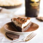 A crispy chocolate cookie crust filled with the most melt-in-your-mouth Irish cream chocolate truffle filling and crowned with a creamy espresso-infused whipped cream!