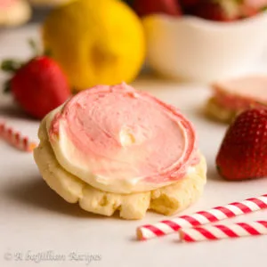 Soft and chewy lemon sugar cookies frosted with marbled lemon and strawberry buttercream!