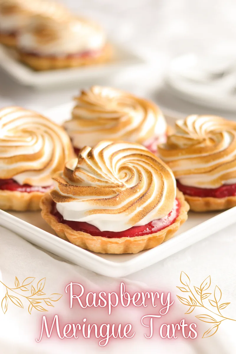 Lusciously tart raspberry curd in a buttery flakey crust and crowned with the fluffiest Italian meringue!