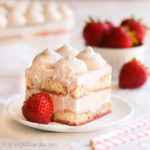 Layers of strawberry-infused ladyfingers and sweet strawberry mascarpone cream filling come together to make a refreshingly fruity version of a classic Italian dessert!