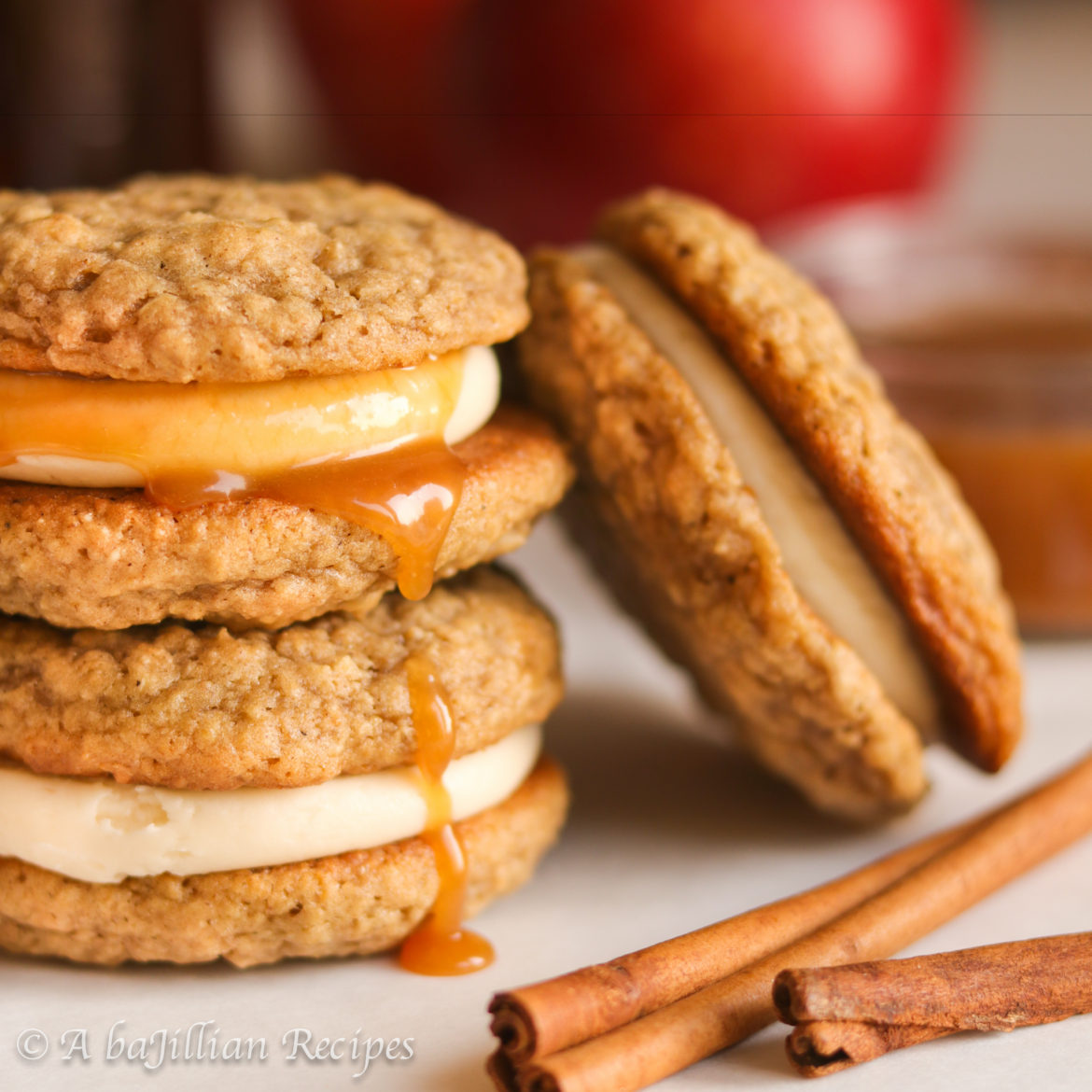 Soft and chewy apple cider-spiced oatmeal cookies filled with a dreamy creamy salted caramel cream cheese frosting!