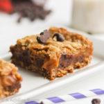 Soft and chewy oatmeal cookie layers stuffed with melty chocolate chips and ooey gooey caramel!