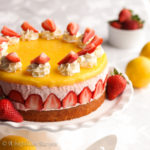 Deliciously moist vanilla cake, creamy strawberry mousse filling, sumptuously tangy lemon curd and fresh strawberries come together to create this impressive dessert!