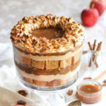 Fluffy cubes of apple cider-infused cake, caramel cheesecake filling, cinnamon-spiced apples, luscious salted caramel, and toasted pecans ALL together in one show stopper of a trifle!