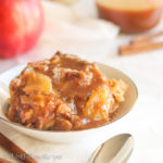 Buttery croissants and fresh apples baked in a salted caramel custard and generously drizzled with even MORE salted caramel! This Salted Caramel Apple Bread Pudding has comfort written all over it!