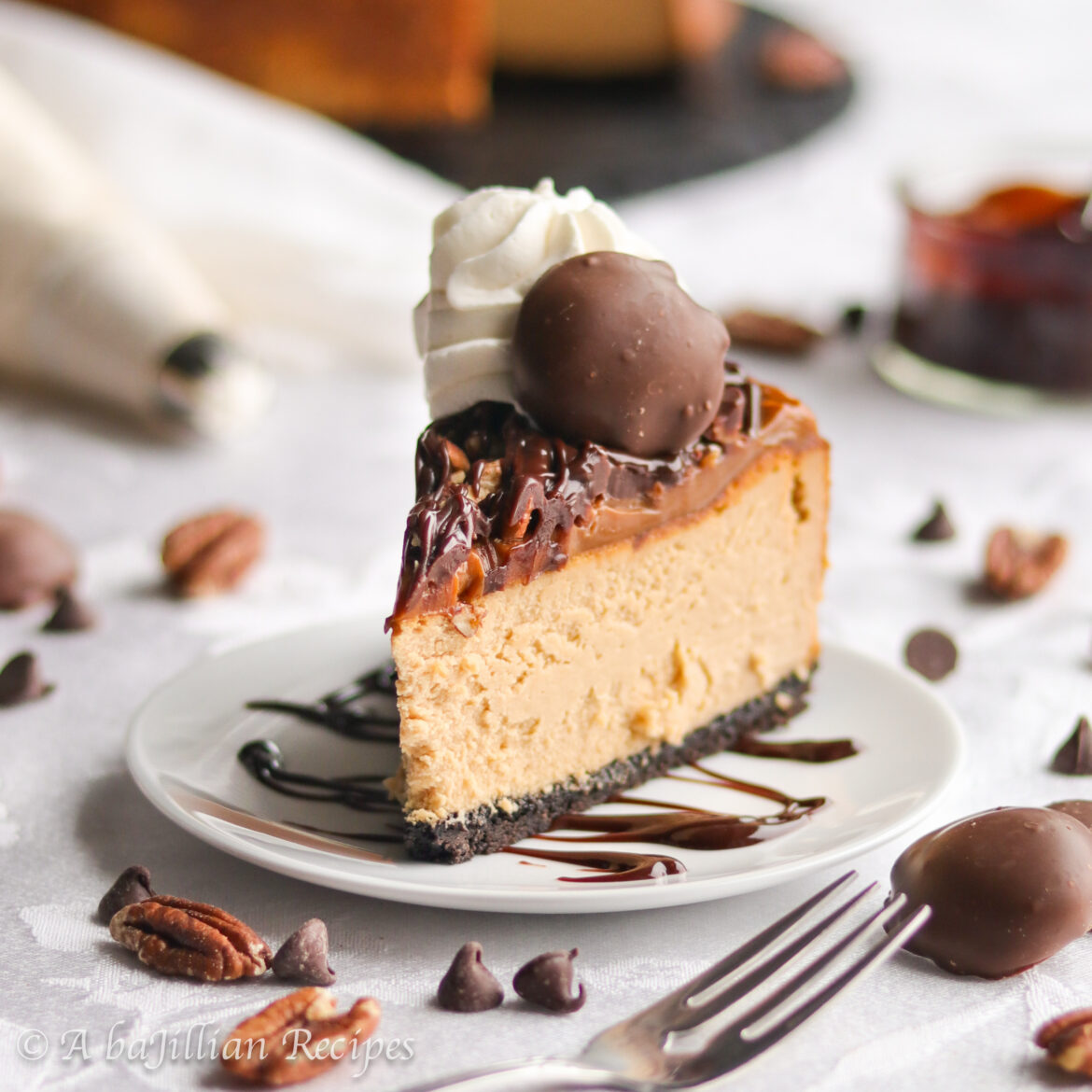 This Turtle Cheesecake is rich, decadent, and supremely creamy! It’s baked in an Oreo cookie crust, topped with caramel, drizzled with chocolate ganache, and covered in toasted chopped pecans!