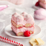 Lusciously creamy layers of raspberry mascarpone filling, raspberry syrup-soaked ladyfingers and grated white chocolate! The perfect dessert to share with your loved one...or just yourself!