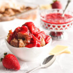 Soft and flakey croissants baked in a luscious white chocolate custard and topped with fresh strawberry sauce!