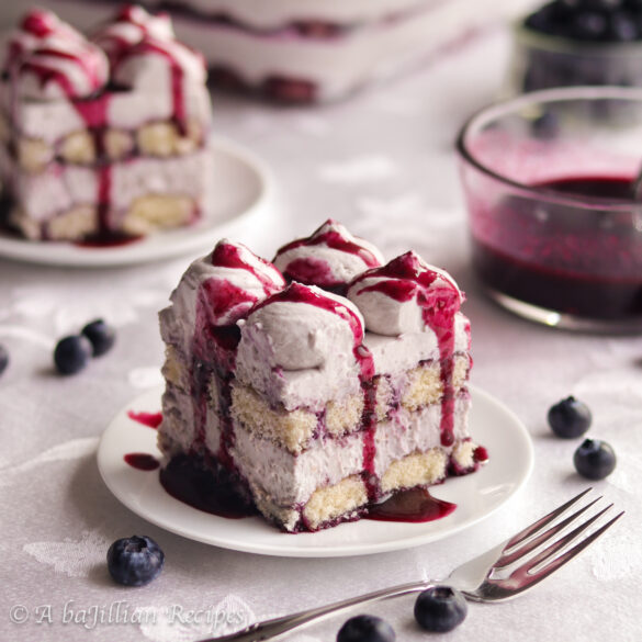 Light and airy blueberry-soaked ladyfingers and luscious blueberry mascarpone cream filling are layered together in this blueberry-licious rendition of a classic Italian dessert!