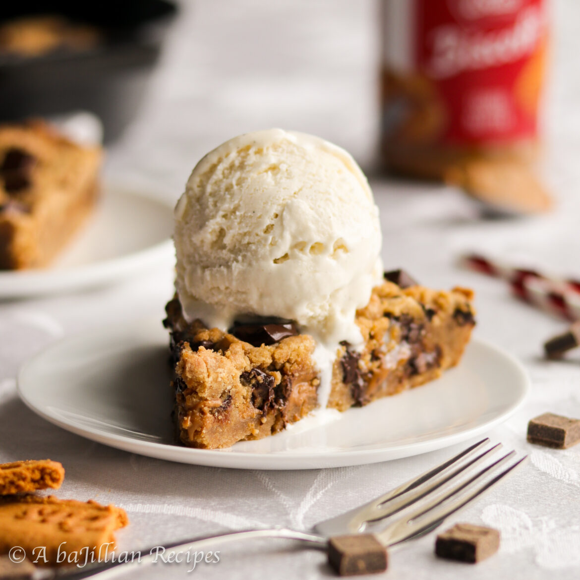 A warm, soft and chewy Biscoff-flavored cookie loaded with creamy cookie butter and melty dark chocolate chunks!