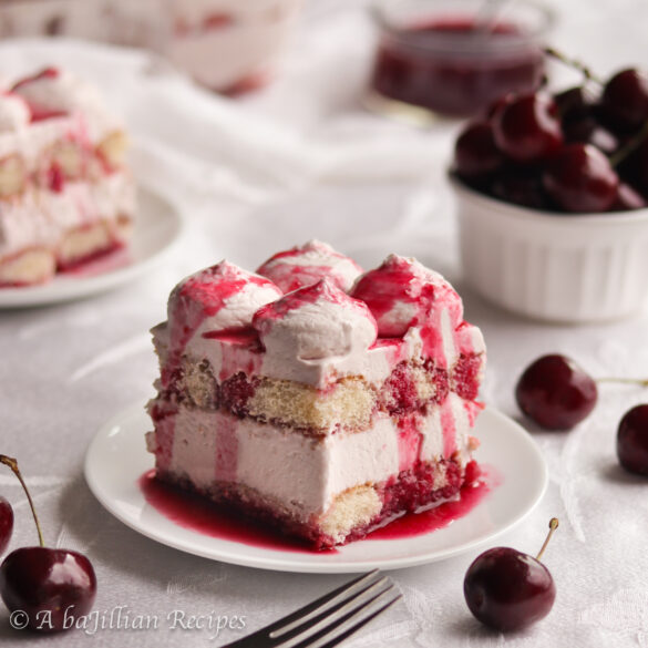 Cherry syrup-soaked ladyfingers that have been spiked with Amaretto liqueur layered between lusciously creamy cherry mascarpone filling!