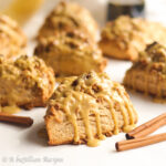 These soft, buttery, and incredibly fluffy scones are loaded up with brown sugary oat streusel topping and drizzled in a silky smooth maple icing!