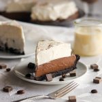 Smooth and velvety chocolate filling infused with eggnog and a hint of espresso, all nestled in an Oreo cookie crust and topped with eggnog whipped cream!