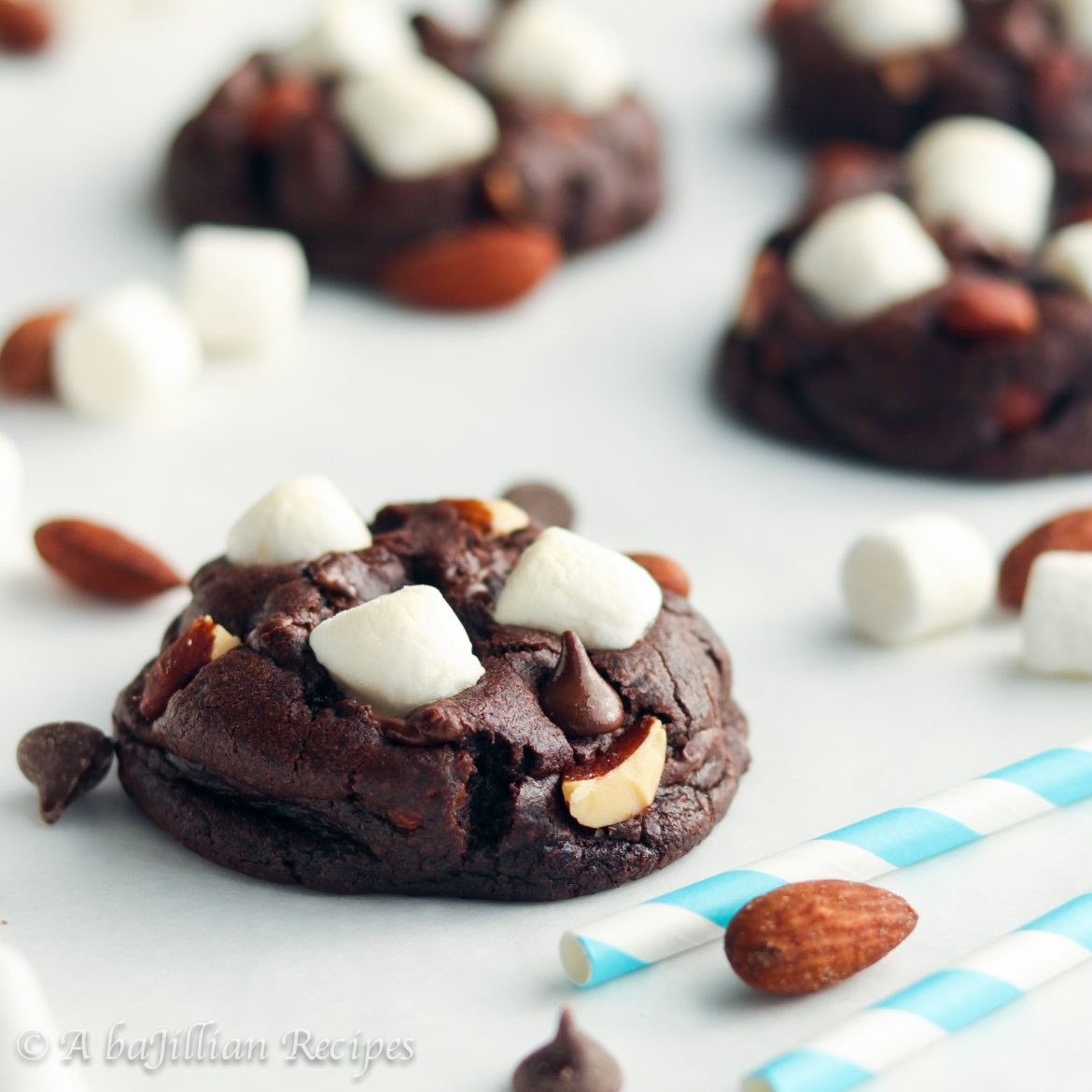 Soft and chewy chocolate cookies stuffed with melty marshmallows and loaded up with crunchy almonds and chocolate chips!