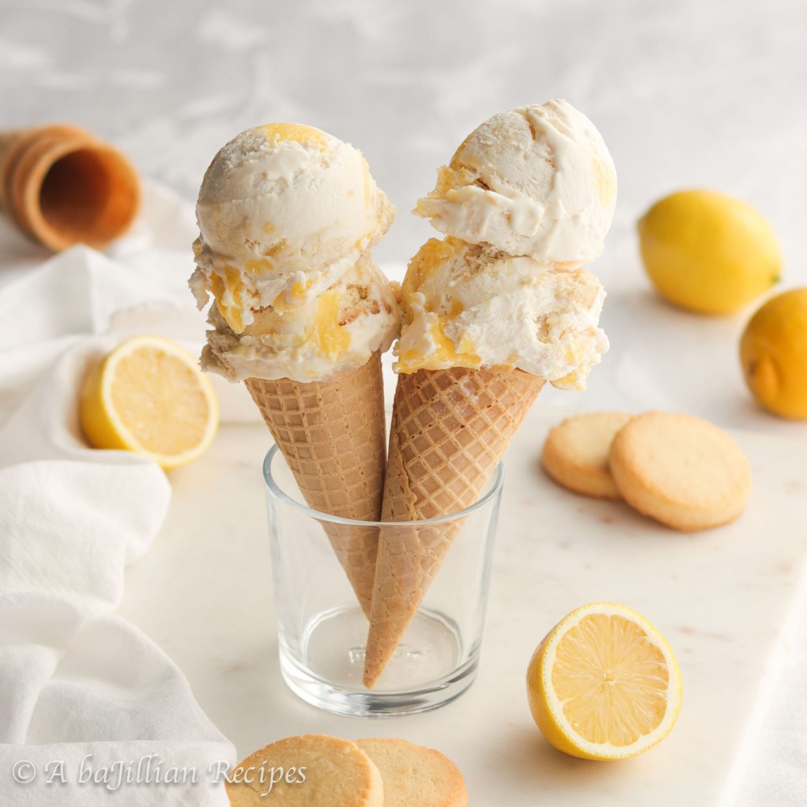 Unbelievably creamy lemon ice cream brimming with swirls of luscious lemon curd and buttery shortbread cookies!