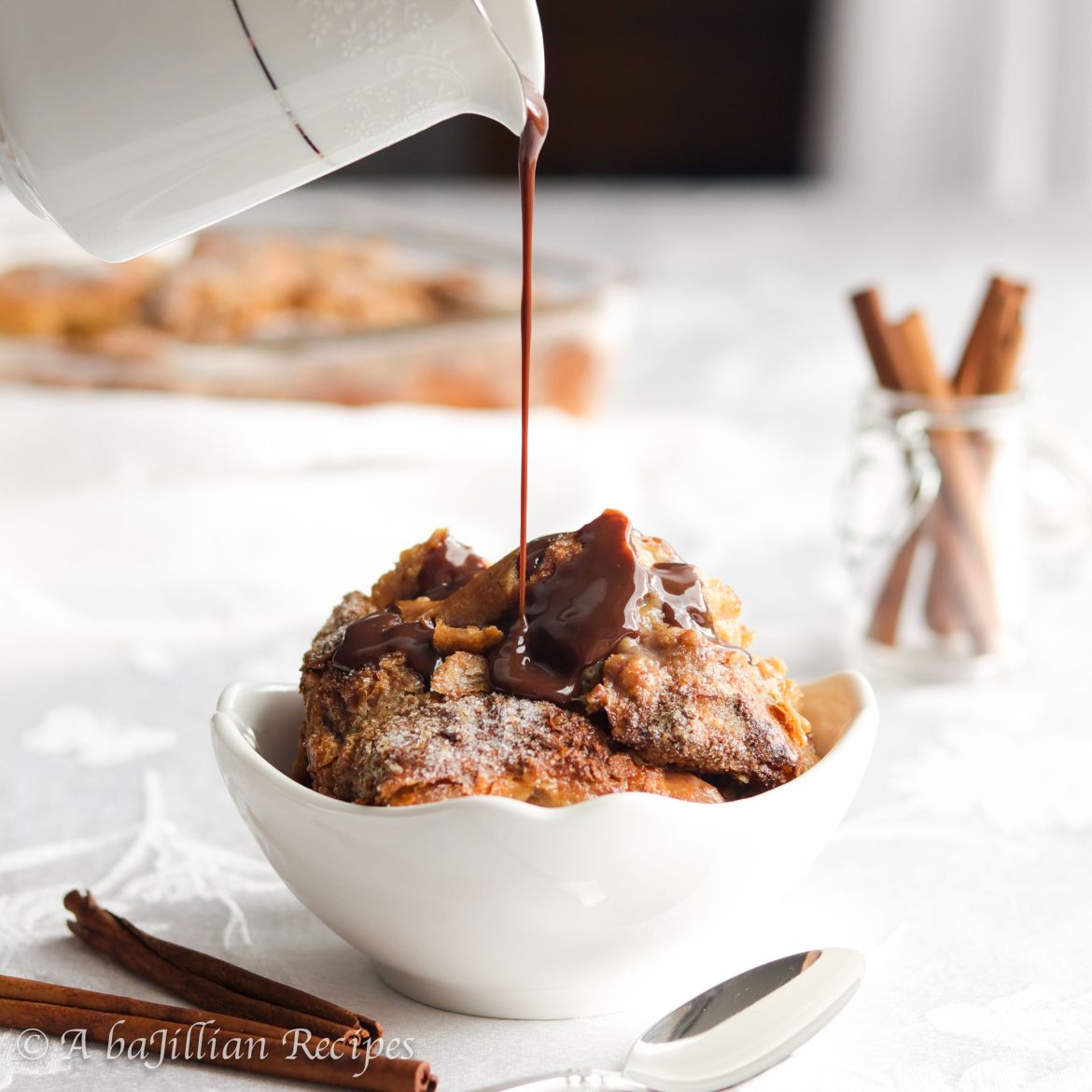 Flakey croissants submerged in a creamy tres leches custard, baked to golden perfection, and drizzled in a silky smooth Mexican chocolate sauce!