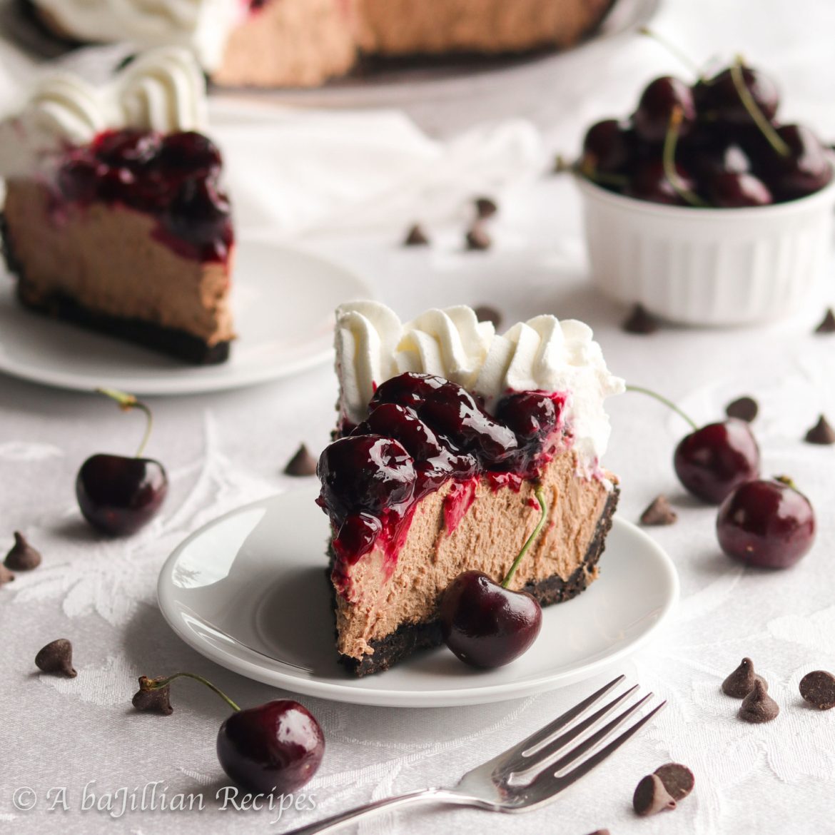 A crisp chocolate cookie crust filled with smooth, velvety chocolate filling, and topped with homemade cherry sauce!