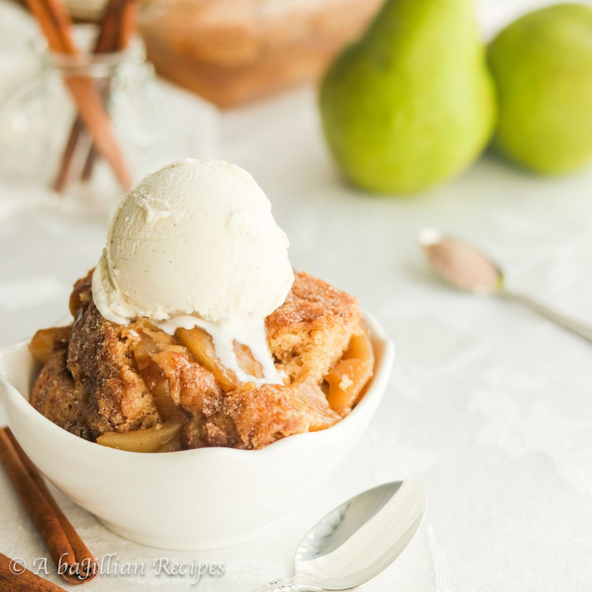 Fresh fall pears baked to perfection in a lusciously sweet brown sugary sauce and topped with a soft and buttery snickerdoodle cookie crust!