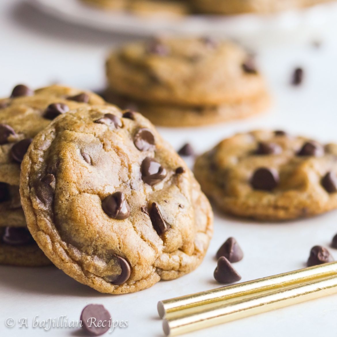 Perfectly soft and chewy pumpkin cookies infused with brown butter and warm spices and studded with rich chocolate chips!