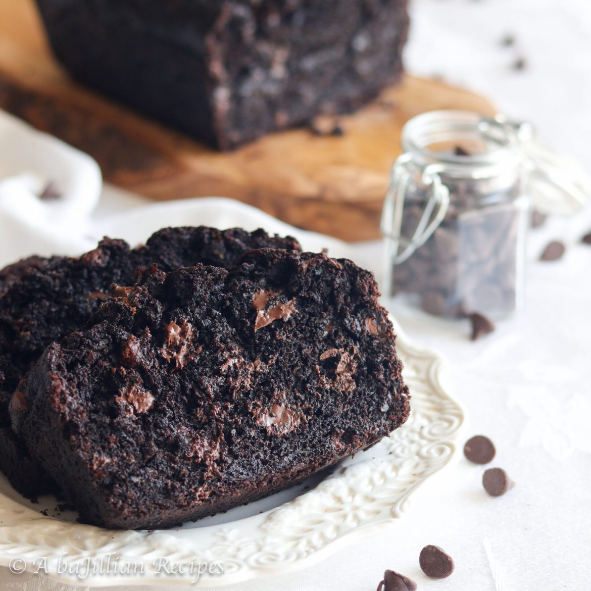 This Triple Chocolate Zucchini bread is perfectly moist and loaded with melty milk chocolate and semi-sweet chocolate chips!