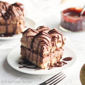 Light as a cloud, this Chocolate Tiramisu is made up of heavenly layers of mocha syrup-soaked ladyfingers, rich chocolate ganache, and fluffy chocolate mascarpone filling!