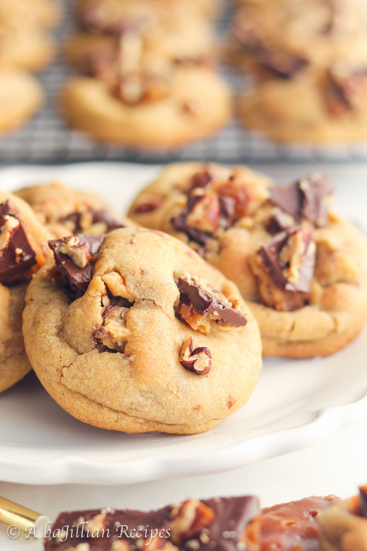 Soft and chewy cookies infused with brown butter and packed with homemade saltine cracker toffee!