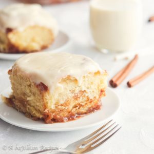 Soft and fluffy cinnamon rolls infused with the richness of creamy eggnog, swirled with caramelized brown sugar filling, and slathered in eggnog cream cheese frosting!