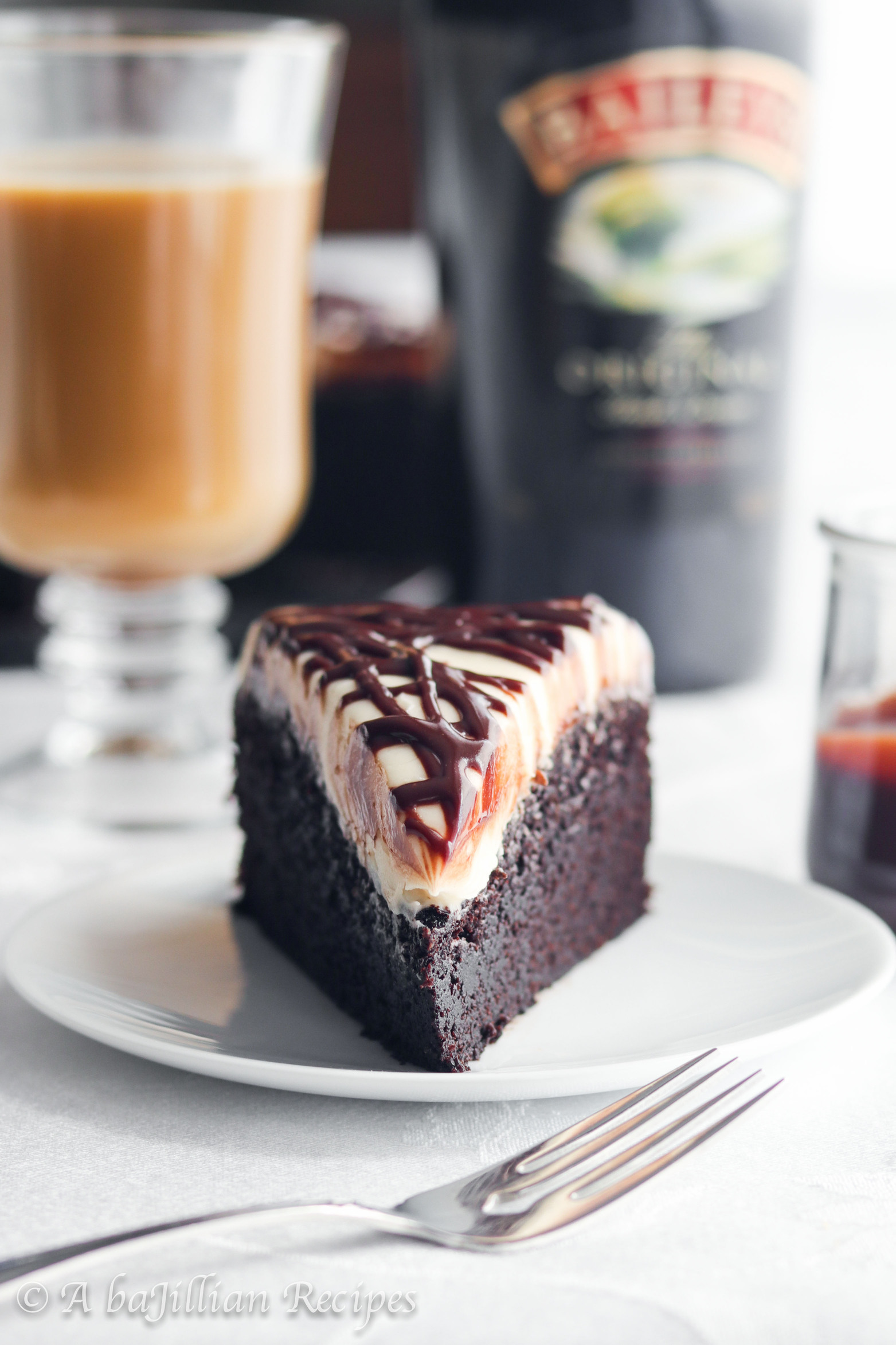 Moist and exceptionally chocolatey, this Chocolate Irish Cream Cake is infused with Irish Cream, slathered in a generous helping of Irish Cream cream cheese frosting, and drizzled in silky chocolate ganache! &nbsp;