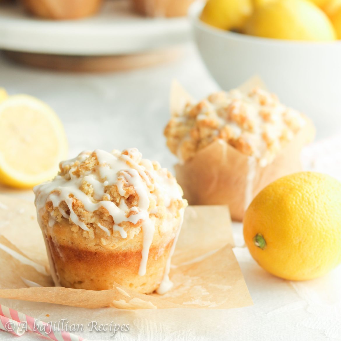 Soft and supremely moist lemon muffins topped with a crisp lemony streusel and generously drizzled in lemon icing!