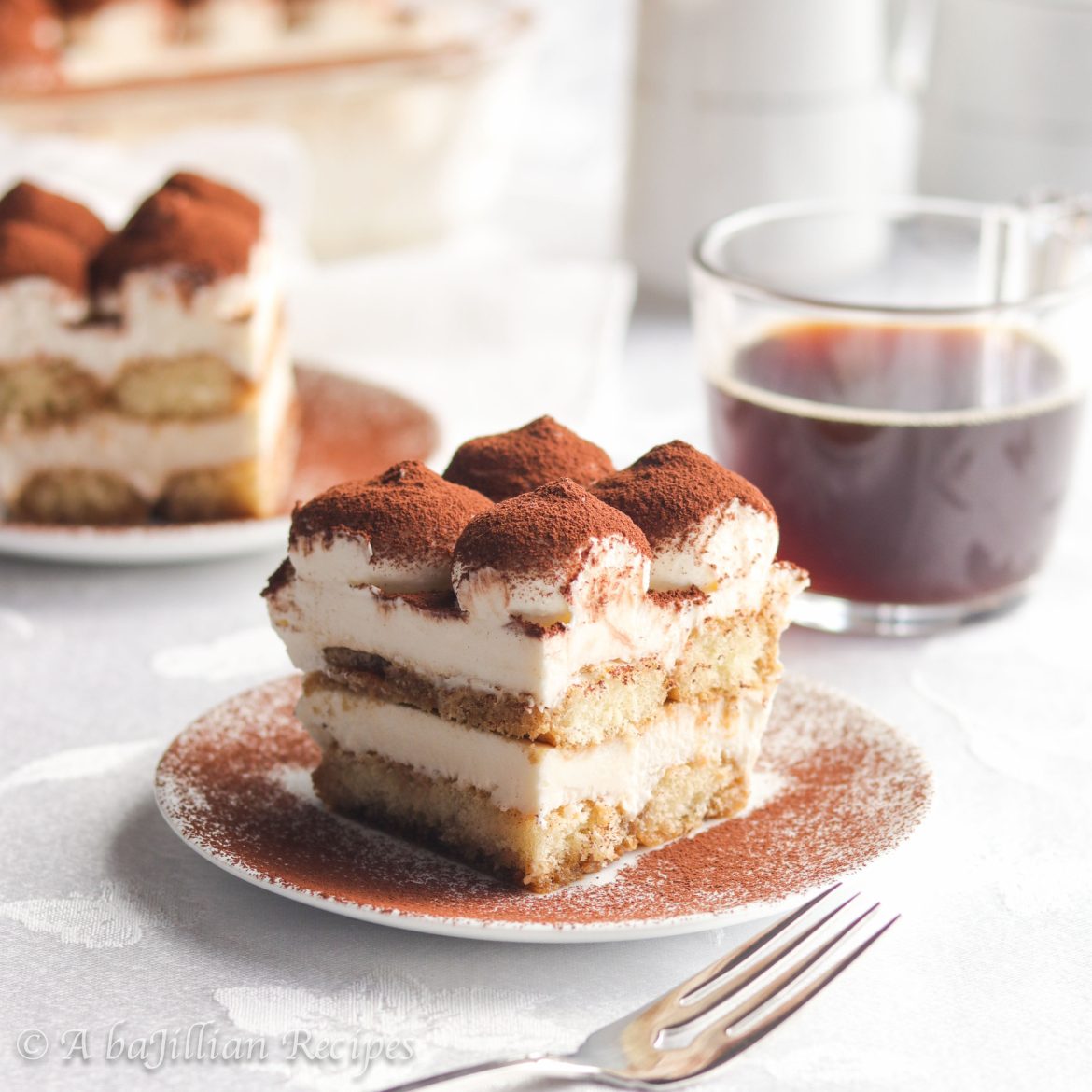 A quick and easy version of the Italian classic! Layers of espresso soaked ladyfingers and sweet mascarpone cream filling come together to make the BEST Tiramisu!