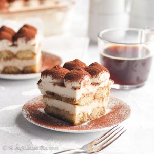A quick and easy version of the Italian classic! Layers of espresso soaked ladyfingers and sweet mascarpone cream filling come together to make the BEST Tiramisu!