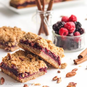 A lusciously jammy filling of raspberries, blackberries and rhubarb paired with a buttery, brown sugary crumble crust and topping!