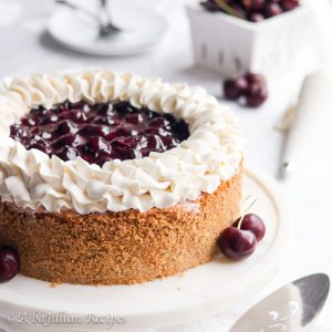 Exquisitely light and heavenly no-bake cherry cheesecake filling nestled in a crisp graham cracker crust and topped with a homemade sweet cherry topping!
