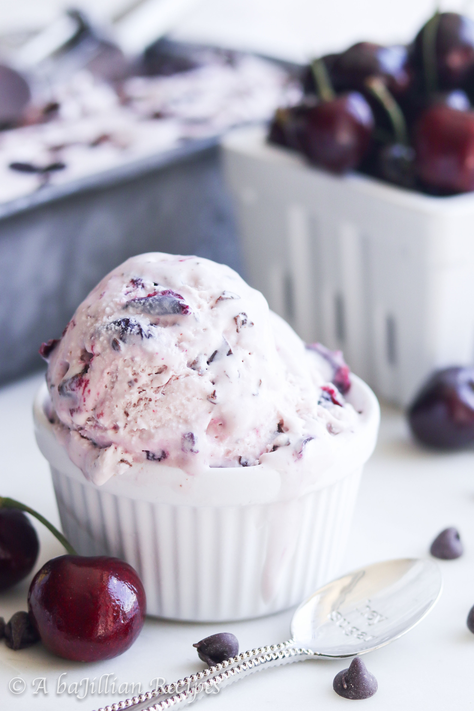 Incredibly creamy no-churn ice cream infused with the natural sweetness of fresh cherries, loaded with flecks of dark chocolate and sweetened cherries!