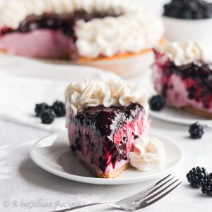Smooth and creamy blackberry filling nestled in a crispy graham cracker crust and finished with homemade blackberry topping!
