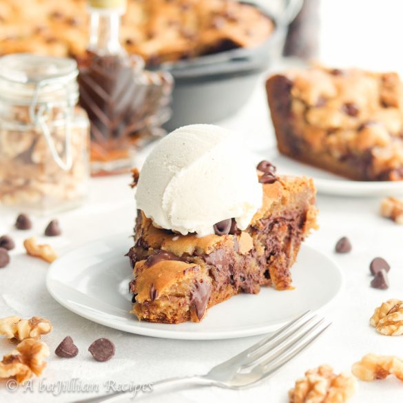 Soft, warm, and perfectly doughy in the middle, this Brown Butter Maple Walnut Pizookie is loaded with toasted walnuts and melty pockets of chocolate!